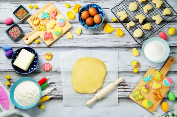 Sugar dough Easter cookies and ingredients for baking
