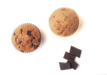 Homemade muffin with raisins and chocolate cupcake. selective focus