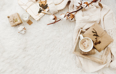 Winter cozy background with cup of coffee, warm sweater and old letters. Flat lay for bloggers - 190487496
