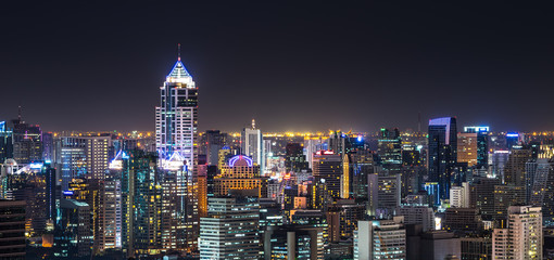 Fototapeta na wymiar Panoramic Bangkok Skyscraper Cityscape at Night Time, Thailand.