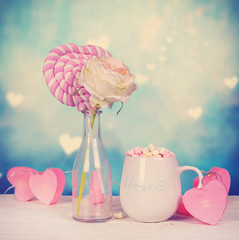 valentines decoration with mug of hot drink with colorfull marshmallows
