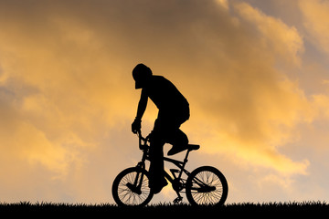 Obraz na płótnie Canvas bike trial at sunset