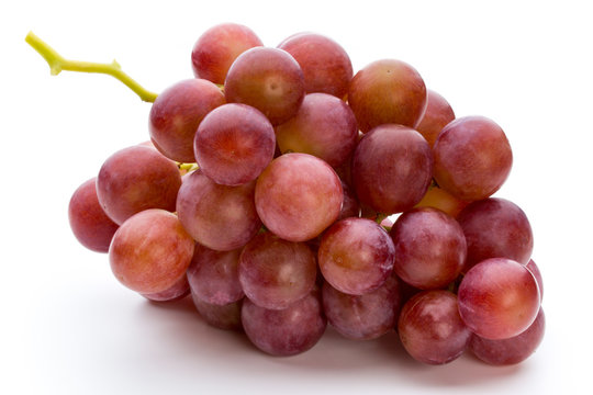 Ripe red grape isolated on white.