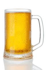 cold mug of beer with foam isolated on white background