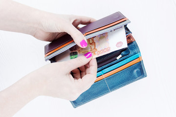 purse with money in hands