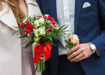 the bride holding the wedding bouquet