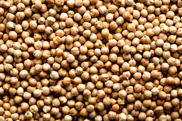 Raw organic dried chickpea texture background. Vegan healthy nutrition. Top view, copy space, healthy lifestyle concept.
