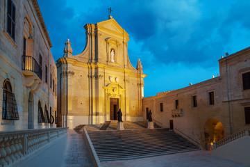 Night view of Citadel, The Cittadella in Maltese, also known as the Gran Castello, a citadel in Victoria, on the island of Gozo in Malta. Popular touristic attraction and destination. - obrazy, fototapety, plakaty