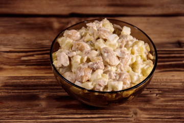 Salad with white kidney beans, potatoes, chicken meat, eggs and mayonnaise
