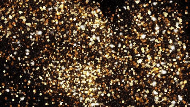 Abstract background with shining bokeh sparkles. Gold particles glitter.