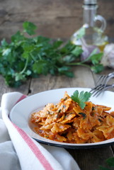 Pasta in tomato sauce with garlic and parsley