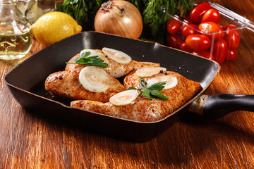 Raw chicken legs marinated