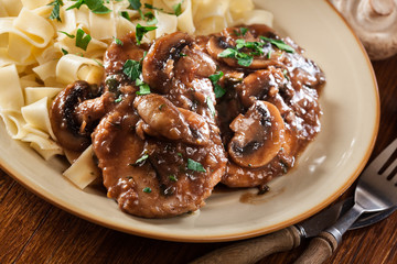 Delicious chicken marsala served with fettucine pasta