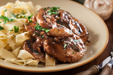 Delicious chicken marsala served with fettucine pasta