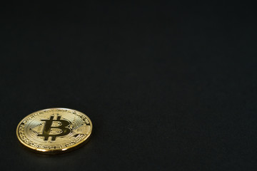 Gold Bitcoins isolated on black background