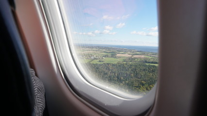 Naklejka premium View of a landscape seen from an airplane window