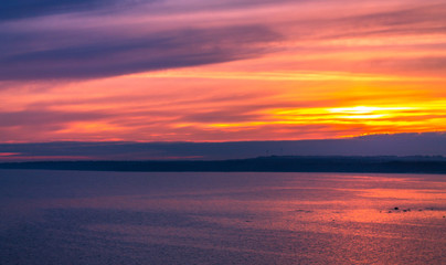 Bright Colorful Sunset On The Sea With Beautiful Clouds