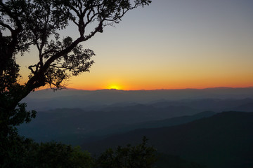 Fototapeta premium Sunset in the mountains at Doi Pui View Point, Chiang Mai, Thailand