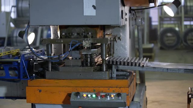Bending Metal, piece of metal is bended by a machine