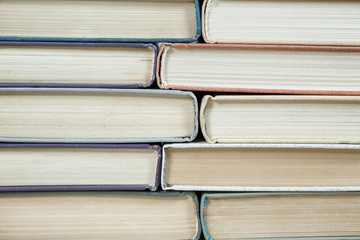 stack of old books pastel colors