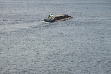 Obraz premium Barge floating on the Dnieper river