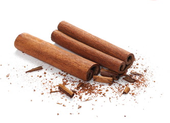 Cinnamon sticks with shavings isolated on white background