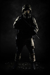 The man in the image of a member of the SWAT police with weapons