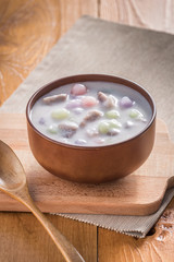 Thailand dessert, Bua Loy in cup on wooden.

