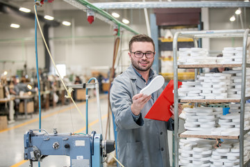 manager at a leather shoe manufacturing factory