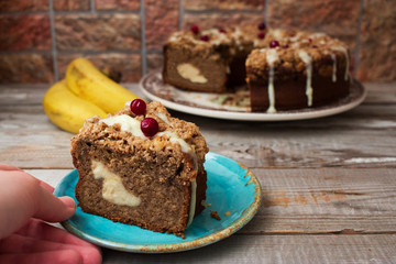 Cream cheese stuffed banana circle cake sweet frosting.