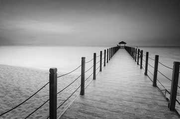 Naklejka premium Long exposure image of old abandoned fisherman jetty in black and white