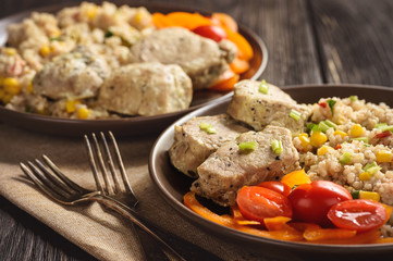Pearl barley porridge with vegetables and pork tenderloin.