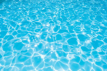 Beautiful ripple wave and blue water surface in swimming pool, Blue water for background and abstract
