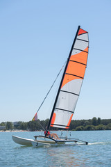 Naklejka premium sailing on a lake - summer and sports theme