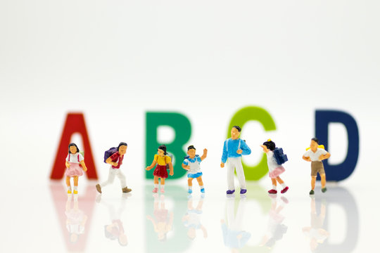 Miniature people: Group childrens at school. Image use for education concept.