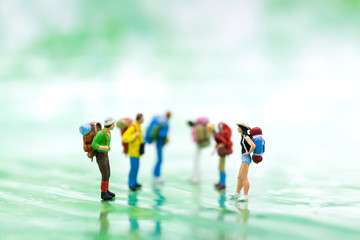 Miniature person : Backpacker travel to destinations in the jungle. Image use for travel business concept.