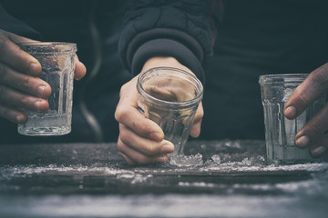 Girls drinking vodka outdoors