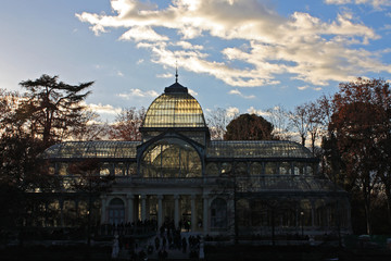 Fototapeta premium Crystal Palace and blue sky with clouds, Madrid, Spain
