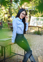 portrait of beautiful woman in garden