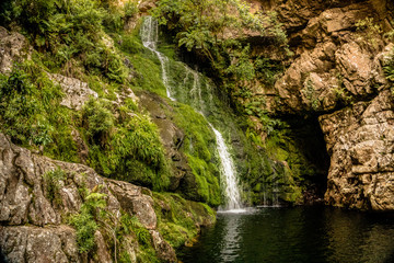 Waterfall surrounded by a rocky area