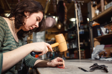 Working process in the leather workshop.