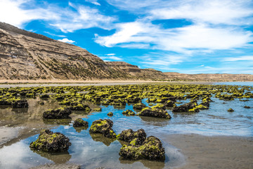 Puerto Piramides beach, sun, waves and sand, beautiful day.