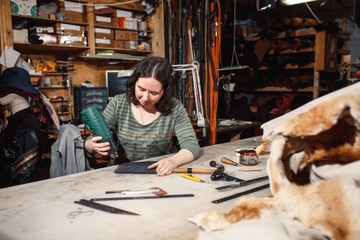 Working process in the leather workshop.
