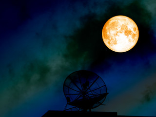 super blood moon silhouette satellite dish on colorful night sky
