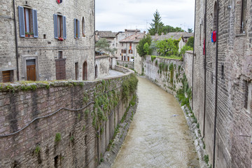 The flow of Camignano in the center of the medieval city of Gubbio. Italy.