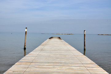 Naklejka premium wooden pier on the sea
