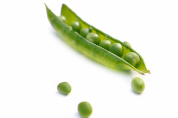 fresh pea in pod isolated on white background