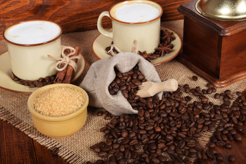 Obraz na płótnie Canvas sweet capucino brewed with freshly ground coffee with cane sugar
