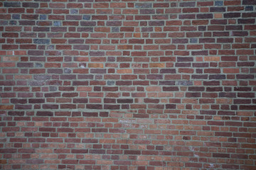 texture of a wall made of red bricks with a white mortar