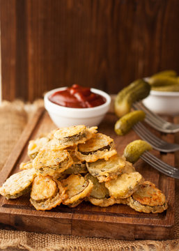 Battered fried pickles with ketchup